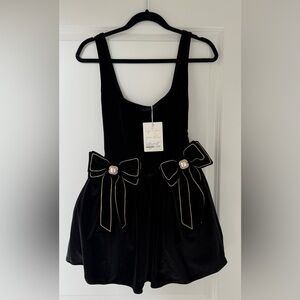 Show Me Your MuMu Black Mini Dress with Bow Accents